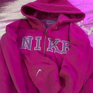 Pink Nike zip up / hoodie